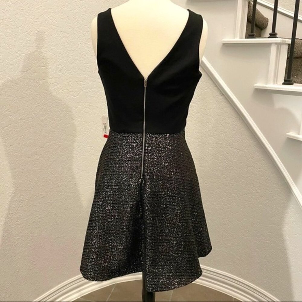 New with tags Charming Charlie black and silver sleeveless party dress. Medium.